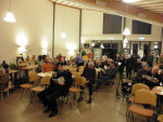 Sfeerimpressie zaal met op de voorgrond de notaris